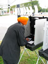 Man with Orange Turban Voting